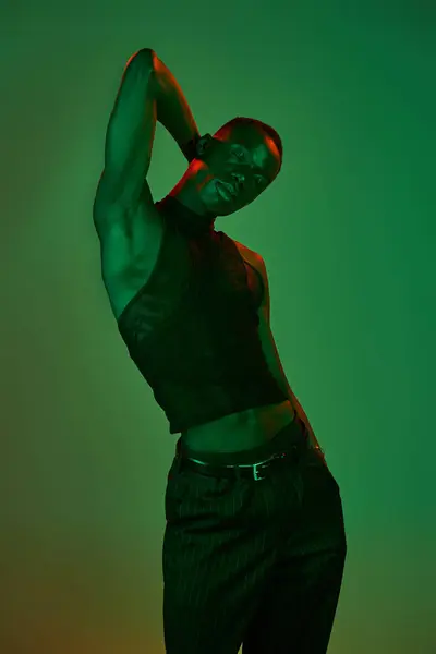 Young african american man strikes a confident pose in stylish, colorful attire. — Stock Photo