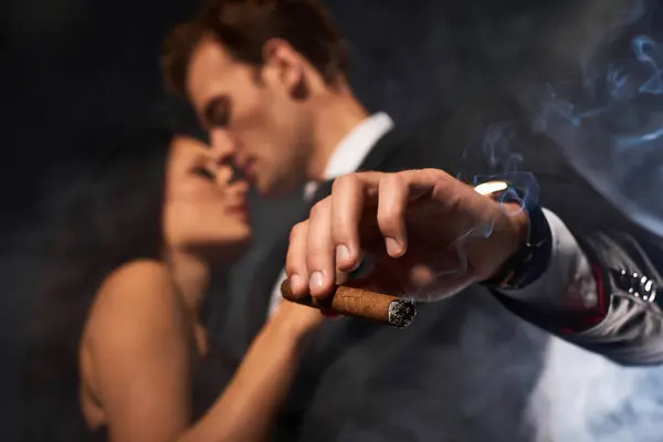 A beautiful couple shares an intimate moment, their lips nearly touching as desire fills the air. — Stock Photo