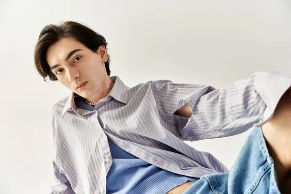 Fashionable non binary individual poses confidently, celebrating unique identity and style. — Stock Photo