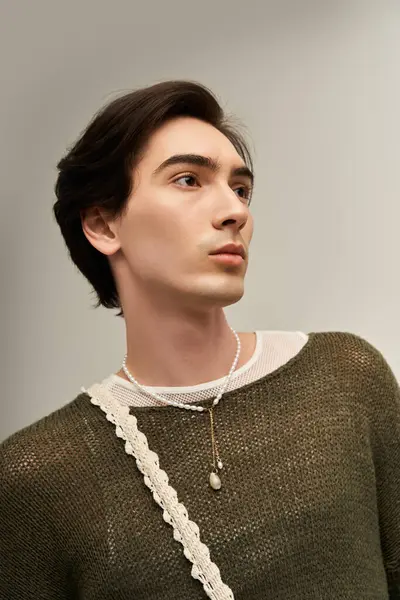 Fashionable young individual embodies confidence and pride in a chic urban environment. — Stock Photo