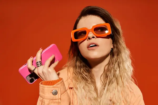 Pretty young woman showcases her unique style with bold accessories and a colorful outfit. — Stock Photo
