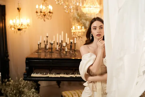 A beautiful young woman stands gracefully, taking in the enchanting vintage decor surrounding her. — Stock Photo
