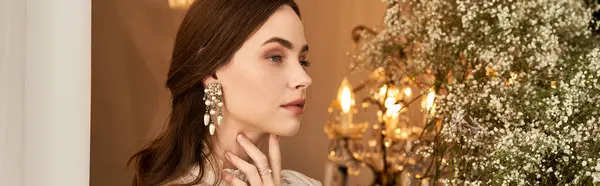 A beautiful young woman with a serene expression showcases vintage charm in an elegant setting, banner — Stock Photo