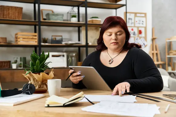 Elegant woman explores her creativity while working in a bright and modern art studio. — Stock Photo