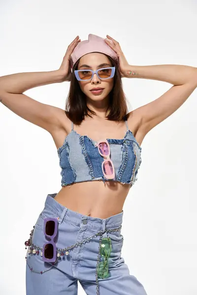 Fashionable woman poses in eye catching attire, demonstrating confidence and style. — Stock Photo