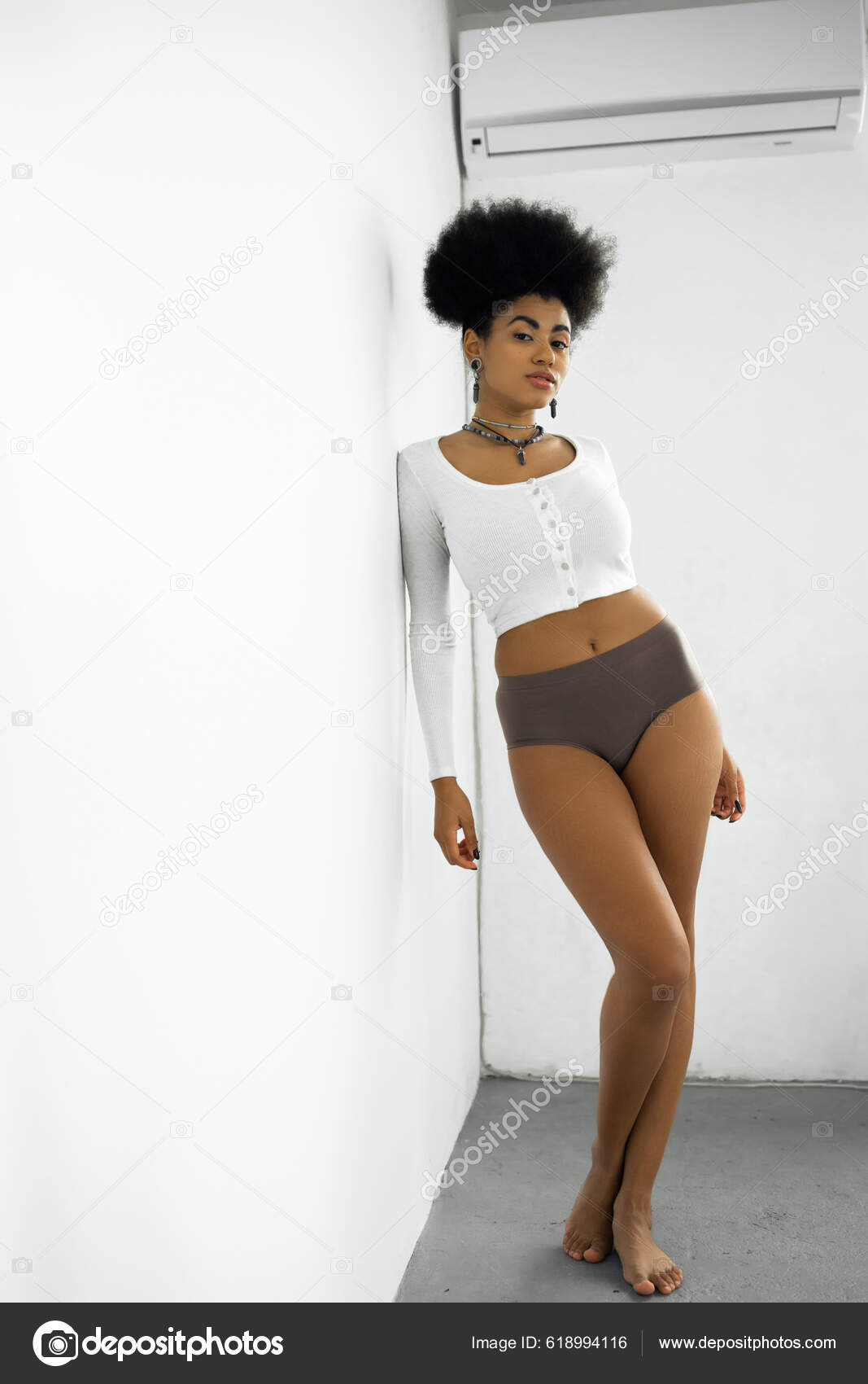 Full Length Barefoot African American Woman Long Sleeve Shirt Underwear  Stock Photo by ©AllaSerebrina 618994116
