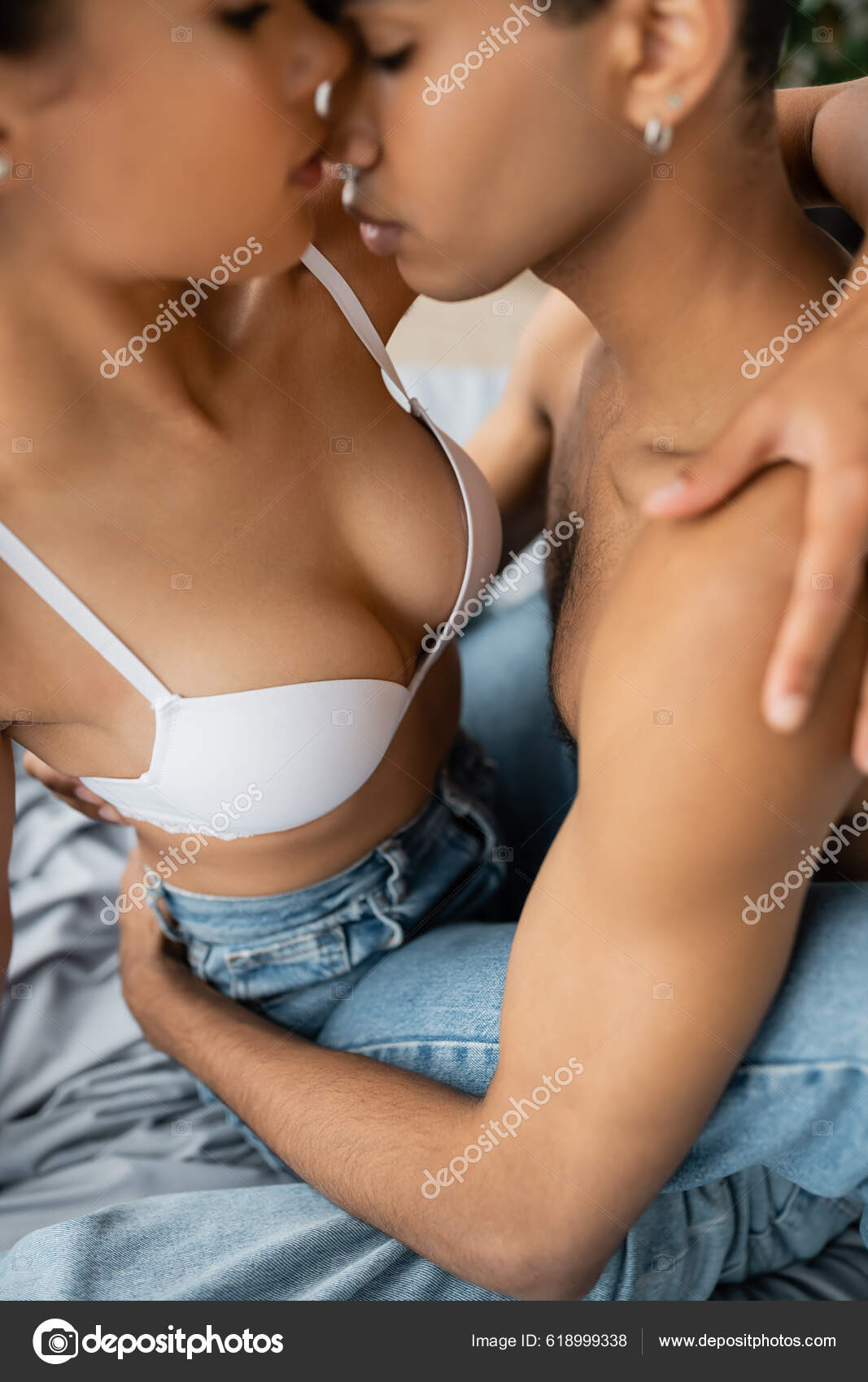 Young Woman Sexy Breast Kissing Shirtless African American Man Blurred  Stock Photo by ©AllaSerebrina 618999338