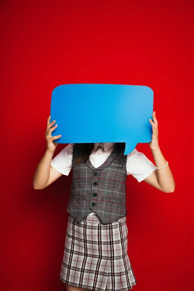 Preteen Child Checkered Vest Skirt Obscuring Face Blue Speech Bubble — Stock Photo, Image