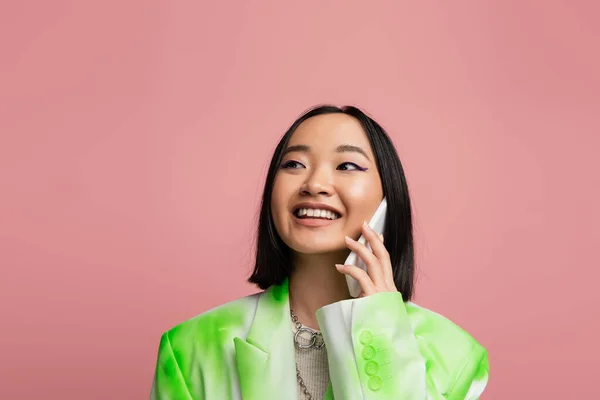 Fashionable Asian Woman Smiling Looking Away While Talking Mobile Phone —  Fotos de Stock