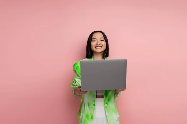 Young Asian Woman Trendy Jacket Holding Laptop Smiling Camera Isolated —  Fotos de Stock