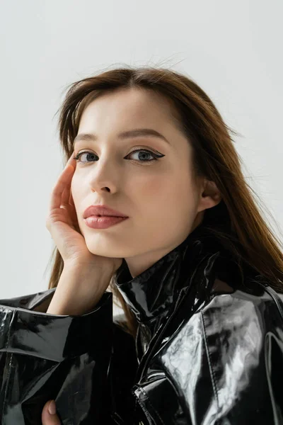 Portrait Young Woman Black Latex Jacket Looking Camera Isolated Grey — Foto de Stock