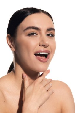 amazed young woman with natural makeup and opened mouth isolated on white clipart