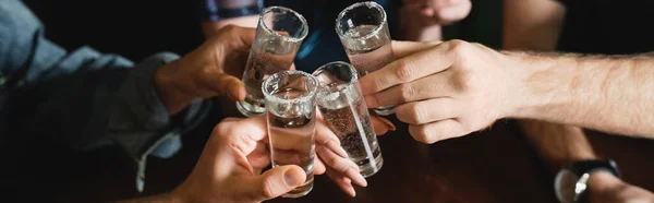 Cropped View Multiethnic Friends Clinking Tequila Shots Bar Evening Banner — Stock Photo, Image