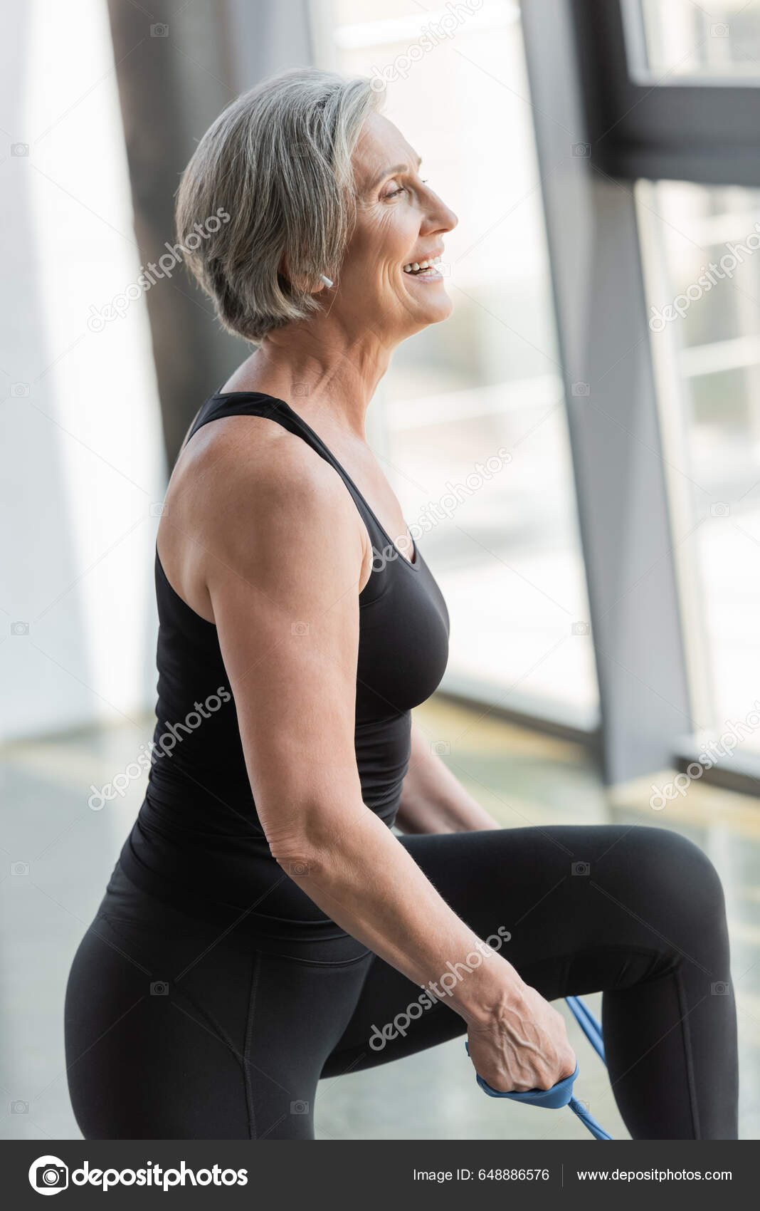 Side View Happy Senior Sportswoman Black Leggings Tank Top Exercising Stock  Photo by ©AllaSerebrina 648886576