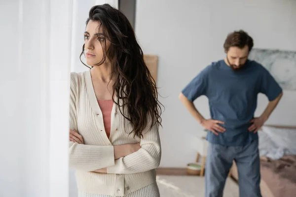 Displeased Woman Standing Curtains Relationship Crisis Blurred Boyfriend Home — Stock Photo, Image