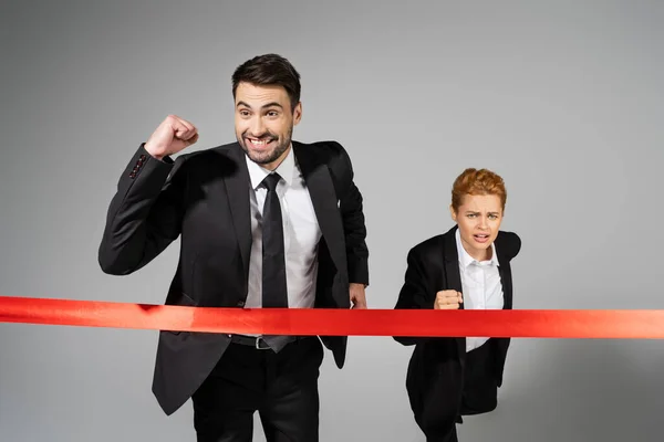 Successful Businessman Showing Win Gesture While Crossing Finish Ribbon Frustrated — Stock Photo, Image