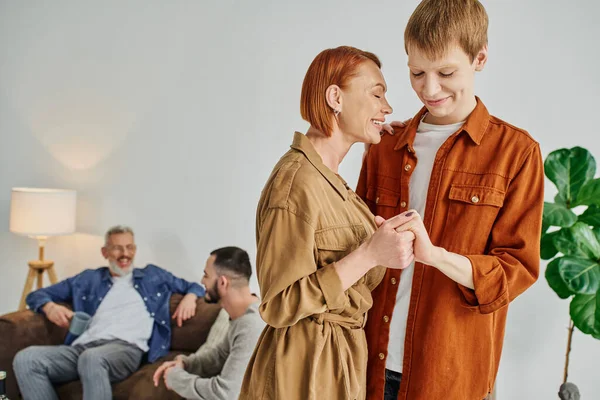 Happy Mother Red Hair Holding Hands Cheerful Gay Son — Stock Photo, Image