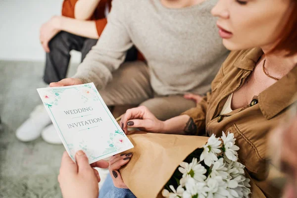 Cropped View Shocked Woman Flowers Looking Wedding Invitation Young Gay — Stock Photo, Image