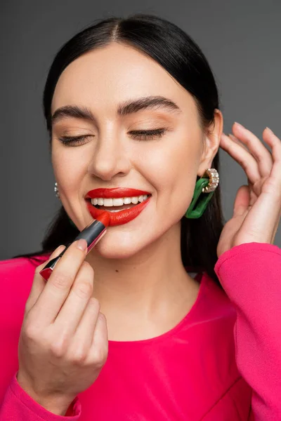 Portrait Gorgeous Woman Trendy Earrings Brunette Hair Applying Red Lipstick — Stock Photo, Image