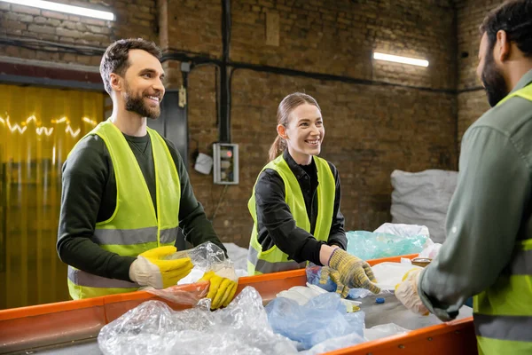 Cheerful Sorters Vests Protective Gloves Sorting Garbage Looking Blurred Indian — Stock Photo, Image