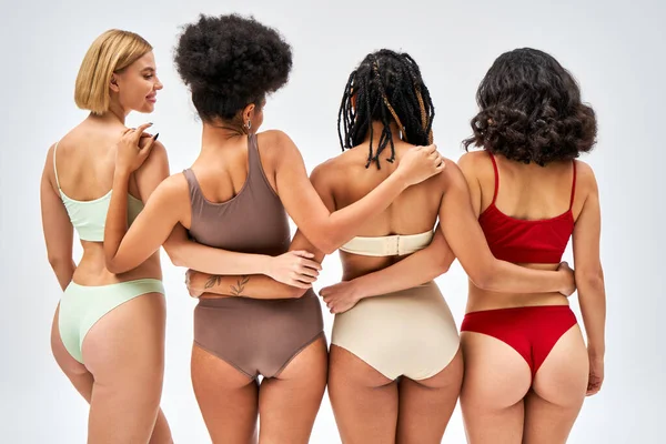 Multiethnic Women Colorful Lingerie Hugging Standing Smiling Friend Posing Isolated — Stock Photo, Image