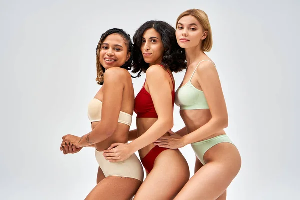 Smiling Multiethnic Women Stylish Colorful Lingerie Hugging Posing While Looking — Stock Photo, Image