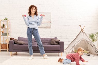 time management, working mother, balanced lifestyle, happy woman exercising with dumbbells near toddler daughter in cozy living room, home workout, sport, busy mom, physical activity, interior  clipart