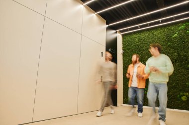 motion blur of creative business partners walking along corridor in modern coworking space with high tech interior, talking and planning business project, collaboration and partnership concept clipart