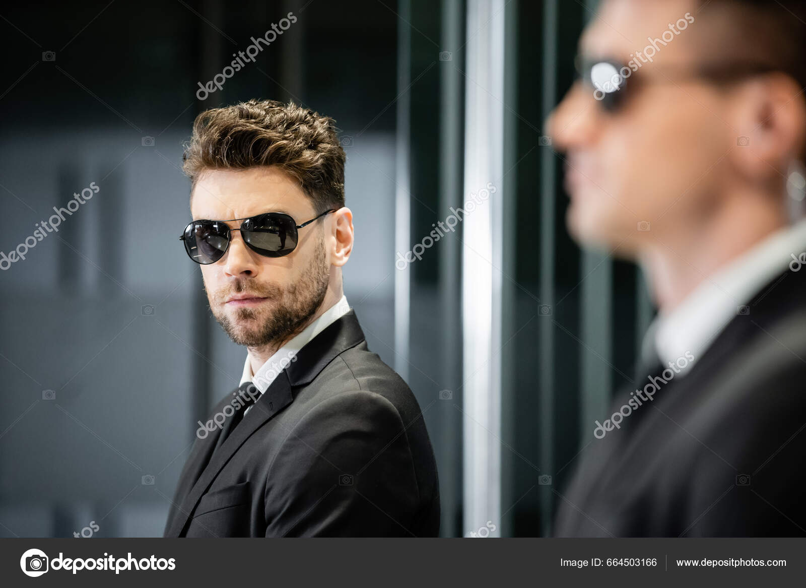https://st5.depositphotos.com/12985790/66450/i/1600/depositphotos_664503166-stock-photo-bodyguard-service-private-security-handsome.jpg