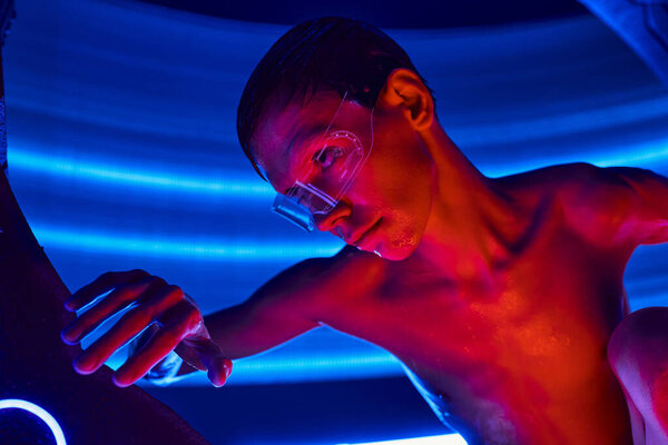 futuristic technologies, humanoid alien in goggles near high-tech equipment in experimental lab