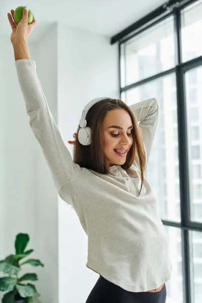 Happy Woman Braces Posing Long Sleeve Panties While Listening Music — Stock Photo, Image