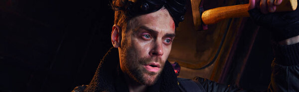 портрет небритого человека с военными очками и топором в пост-темном метро, баннер