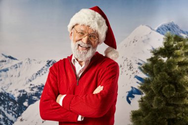 joyous Santa in christmassy hat with glasses with his arms crossed on chest, Merry Christmas clipart