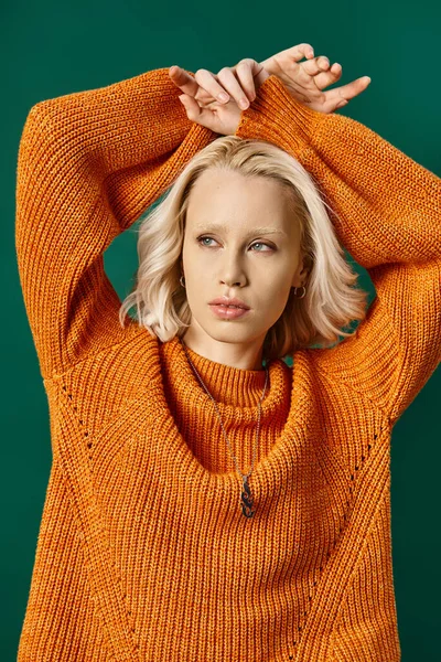 Young Blonde Woman Mustard Yellow Sweater Posing Hands Head Turquoise — Stock Photo, Image