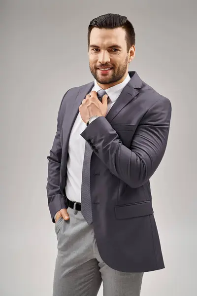 Happy Handsome Man Stylish Suit Adjusting Tie Posing Hand Pocket — Stock Photo, Image