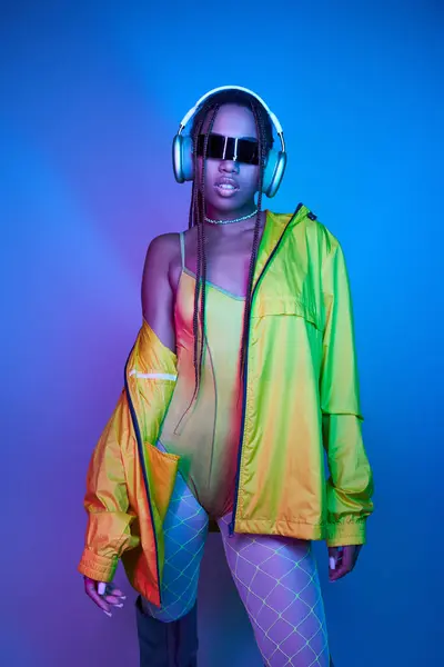 Pretty Dark Skinned Girl Headphones Posing Bodysuit Jacket Studio Neon — Stock Photo, Image