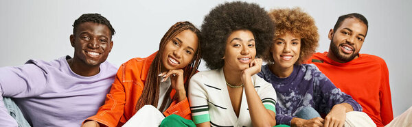 african american people in casual attire spending time together on grey backdrop, Juneteenth banner