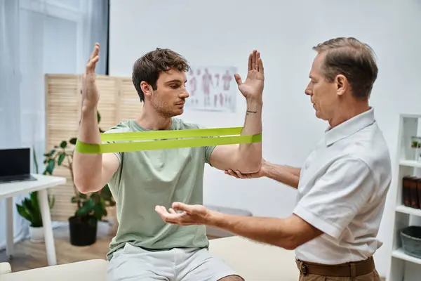 Good Looking Mature Doctor Checking Knees His Patient Hospital Rehabilitation — Stock Photo, Image