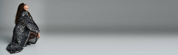 banner of curvy woman in leopard fur coat and sunglasses crouching down sideways and looking to up