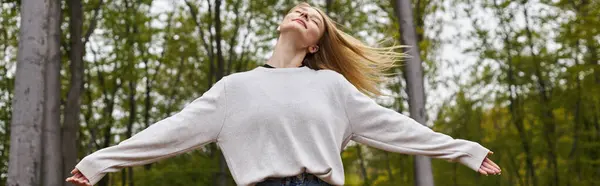 Peaceful Relaxed Blonde Woman Dancing Forest Jeans Sweater Backpacking Trip — Stock Photo, Image