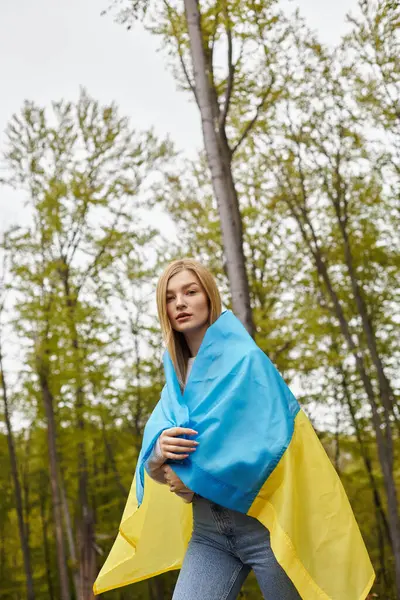 Patriotic Blonde Girl Proudly Holding National Ukrainian Flag Forest Looking — Stock Photo, Image