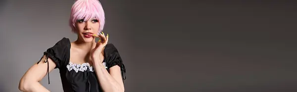 Appealing Woman Cosplaying Anime Character Pink Hair Looking Away Gray — Stock Photo, Image