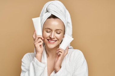 A woman in a bathrobe mysteriously holding a cream over her face, exuding elegance and allure. clipart