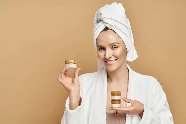 Attractive Woman Flowing White Robe Gracefully Holds Jar Cream Exuding — Stock Photo, Image