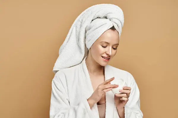 Beautiful Woman White Robe Savors Her Morning Cream Hand Exuding — Stock Photo, Image