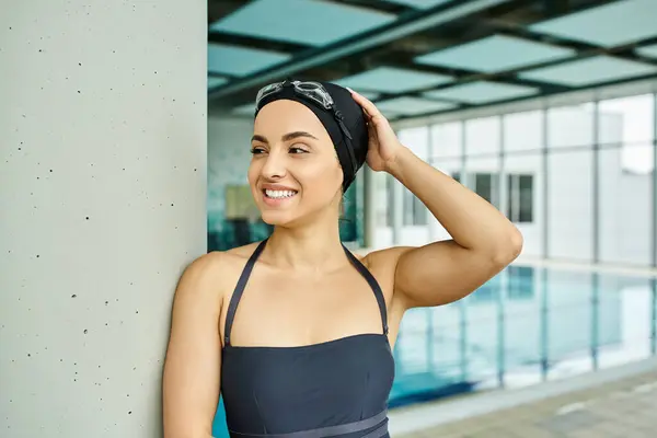 Young Woman Swimsuit Swim Cap Stands Gracefully Next Indoor Swimming — Stock Photo, Image