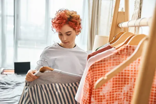 Beautiful Red Haired Extravagant Person Picking Stylish Clothes Rack Home — Stock Photo, Image