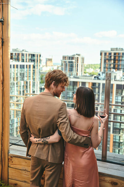 A man and a woman stand side by side, encapsulating a sense of unity, connection, and partnership