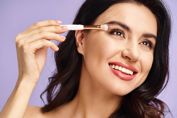 A smiling woman holds a brush, embodying beauty and creativity.