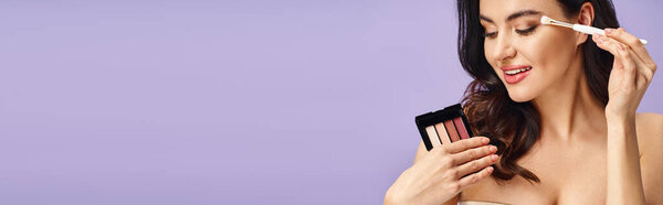 A woman enhances her natural beauty by delicately holding a brush over her eye.